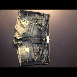 Express studded and distressed denim jeans